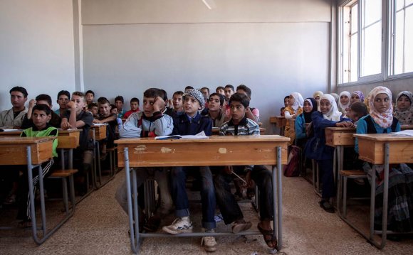 Syrian children attend school